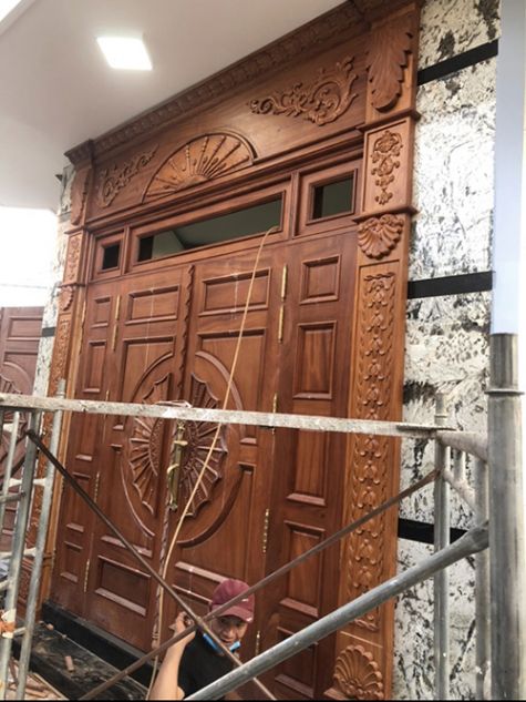 Cửa gỗ đục hoa văn 4 cánh mẫu CG57